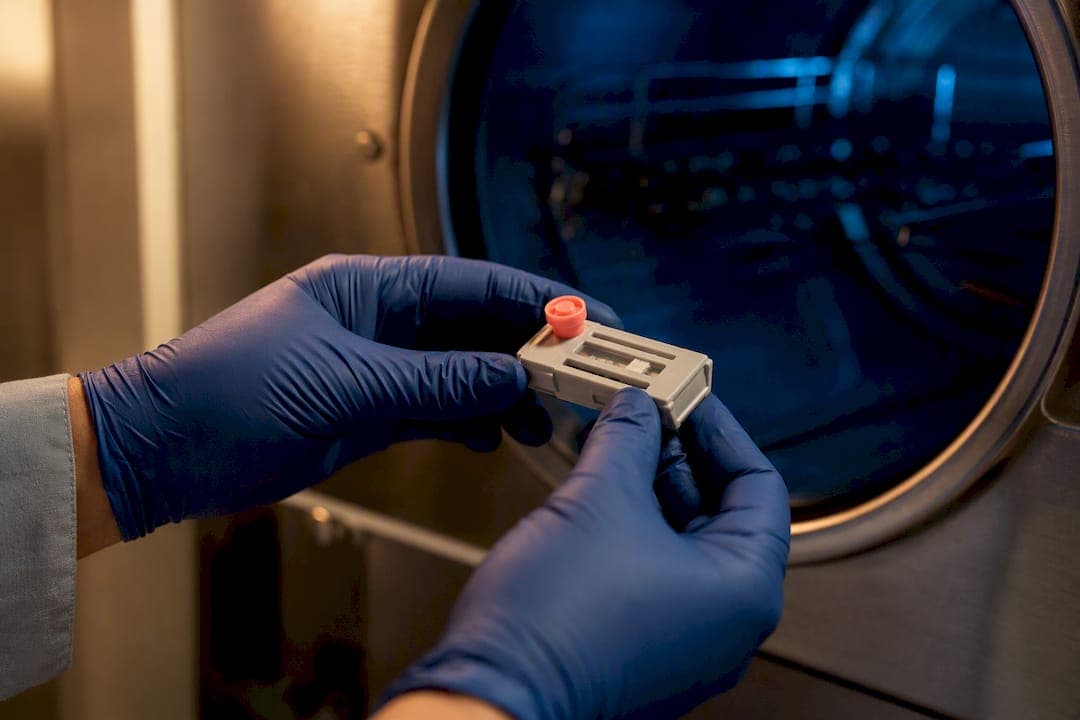 Technician positioning biological indicator for sterilization